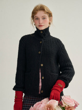 Beary Knit Cardigan with chunky knit texture, offering warmth and cozy comfort for winter styling.