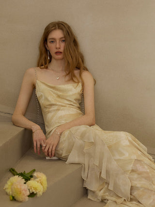 Model wearing the Chain Drop Sleeveless Long Dress with chain strap detail and elegant drape – perfect for sophisticated looks on special occasions