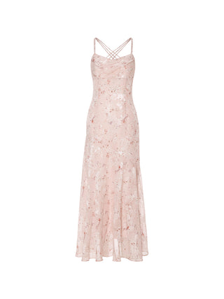 Model wearing the Cross Floral Long Dress with soft floral pattern and cross-wrap design – ideal for romantic summer days