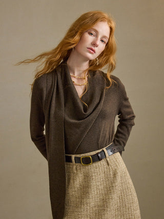 Model wearing the Deep Mocha Drape Knit Top, a deep mocha wool-blend long-sleeve knit with scarf-like draped front detail that adds a sophisticated, polished point to the look – SINCETHEN. 
