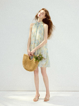 Romantic halterneck mini dress with shirred waist and flared skirt, perfect for summer styling