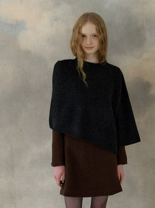 Falling Wool Warmer Cape – wool–yak cape with crew neck, asymmetrical hem, and back button; elegant over-outerwear FW layer