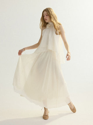 Full shot of the SINCETHEN Ivory Flare Maxi Skirt, highlighting its elegant A-line silhouette and flowy hem.