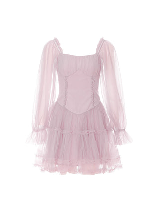Model wearing the Mauve Lace Mini Dress with soft floral lace, a sweetheart neckline, and romantic ribbon details.