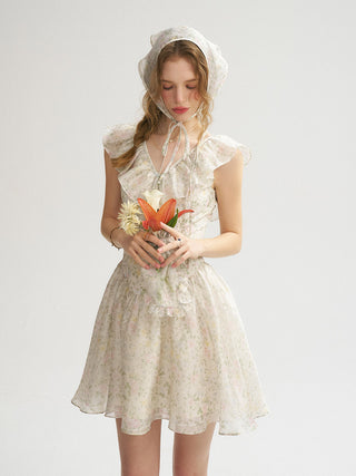 Model wearing the Melody V-Neck Mini Dress with a soft V neckline, pintuck bodice, and flared hem — perfect for a romantic and lovely date look.