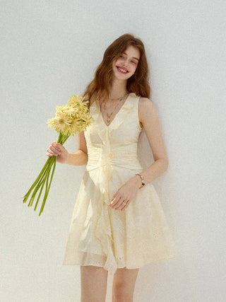 Mini dress with v neckline and layered ruffles, perfect for adding charm to everyday moments