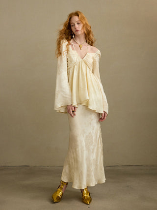 Model wearing the Opaline Jacquard Long Skirt, a floral viscose long skirt with covered elastic waistband and full lining for an elegant dressed-up look – SINCETHEN.