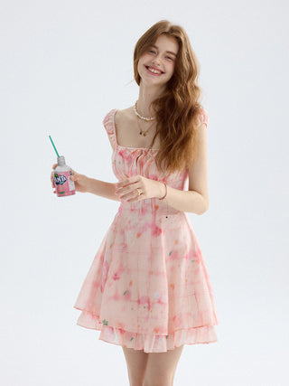 Colorful mini dress with puff sleeves and ruffle hem, perfect for a sweet and lovely summer look
