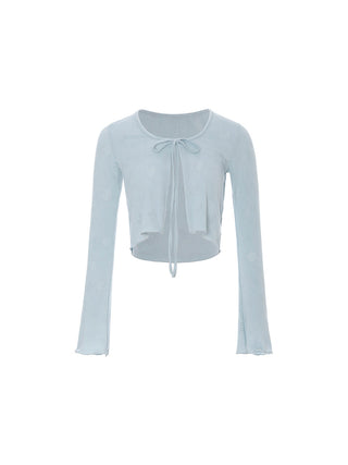 Model wearing the Punching Open Cardigan in blue, featuring a breathable eyelet knit and scalloped edges — perfect for layering over tops and dresses in spring and summer.