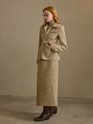 Model wearing the Sand Tweed Long Skirt, a straight tweed long skirt with back slit, hidden back zip and full polyester lining, styled for a formal fall-winter look – SINCETHEN. 