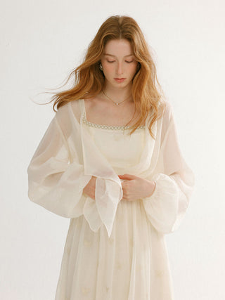 Woman wearing the Sheer Shimmer open cardigan – sheer, lightweight, and perfect for breezy spring and summer layering.