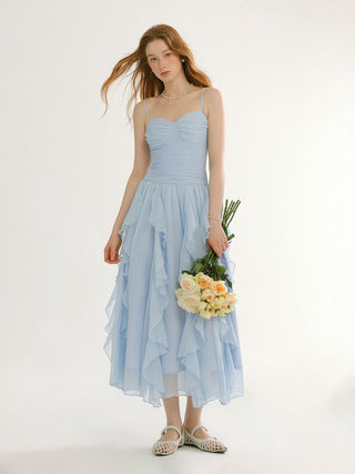 Woman wearing the Windy ruffle long dress – feminine, airy, and perfect for a vacation-ready look.